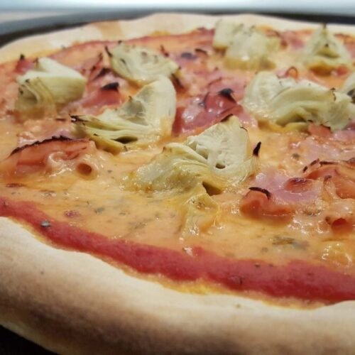 Ham artichoke pizza