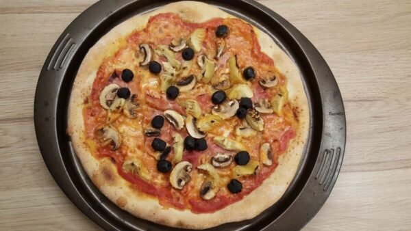 Home baked pizza capricciosa