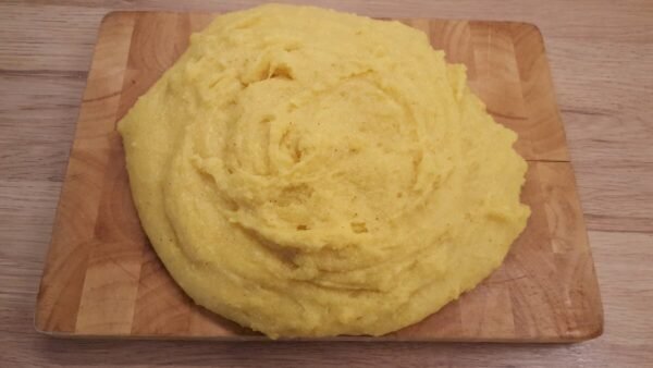 Polenta on cutting board