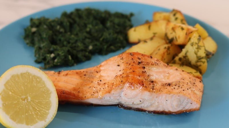 Baked salmon fillet potato spinach