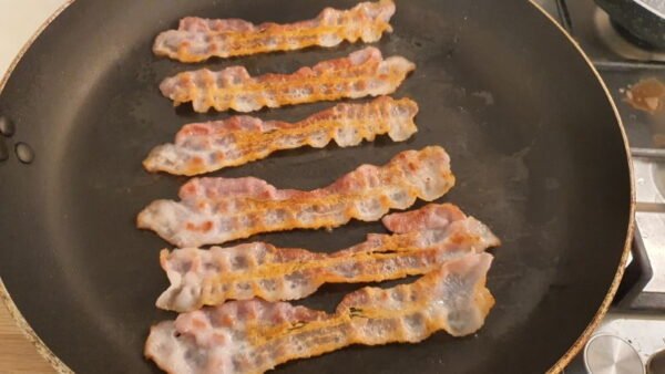 Cooking bacon in pan