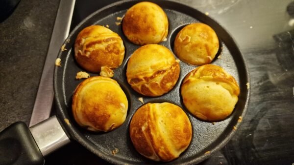 Cooking aebleskiver 4