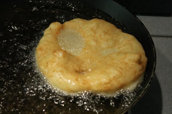 Frying potato lángos