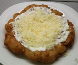 Potato lángos with cheese and sour cream 2
