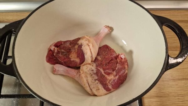 Searing the duck legs