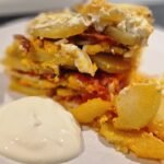 Simple Layered Potato Casserole with Sausage Simple Layered Potato Casserole on a Plate with Sour Cream