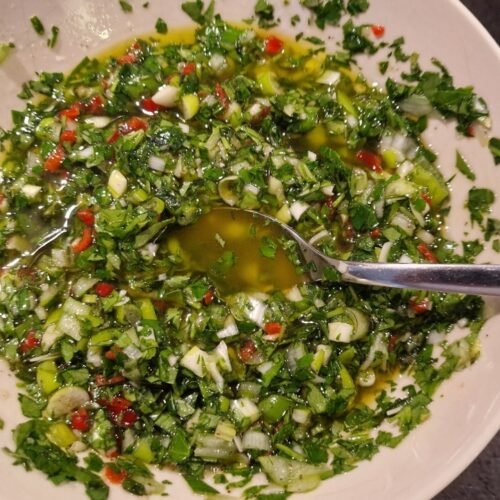 Bowl of homemade chimichurri sauce