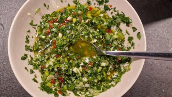 Bowl of homemade chimichurri sauce