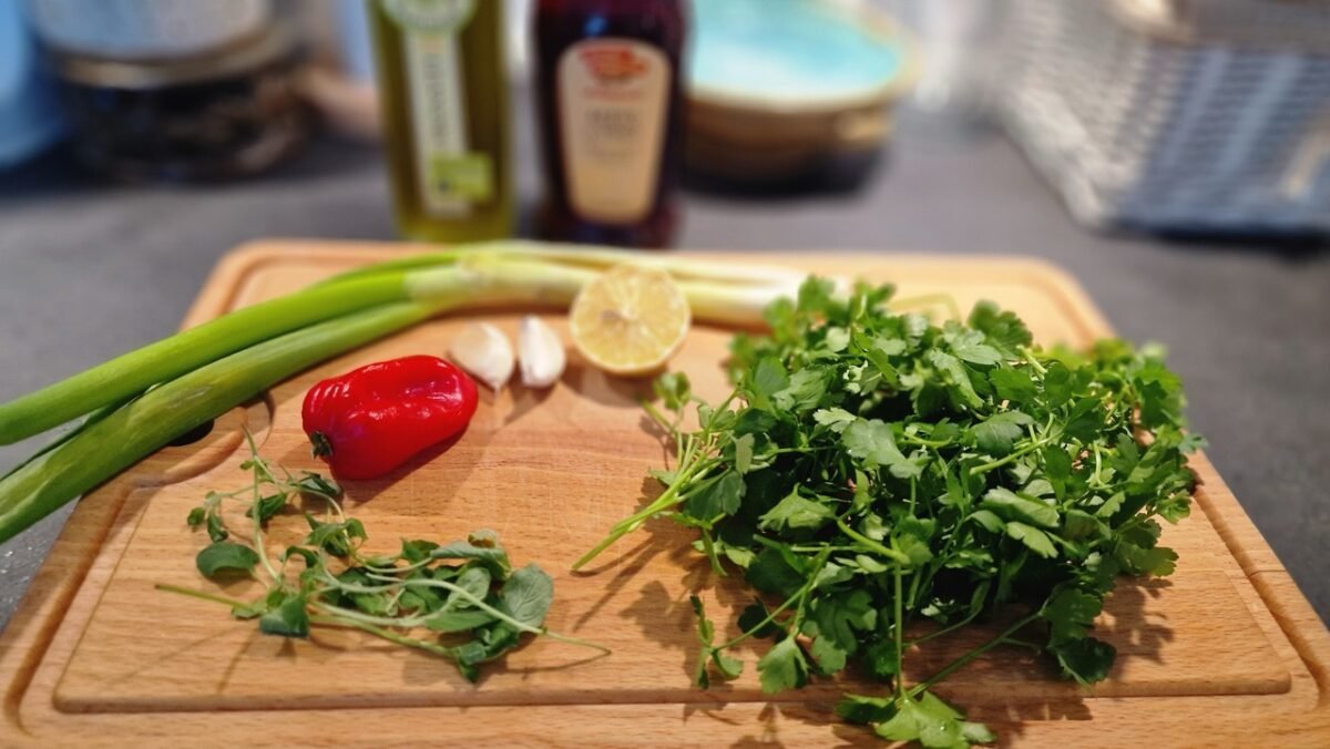 Parsley, scallions, oregano, chile, garlic, olive oil, lemon, and vinegar for chimichurri