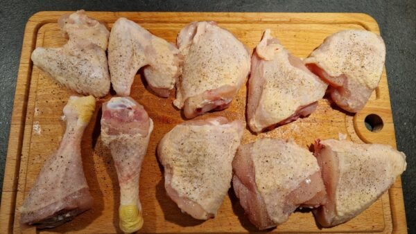 Chicken pieces seasoned with salt and pepper
