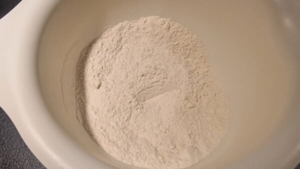 Flour and baking powder mixed in a bowl