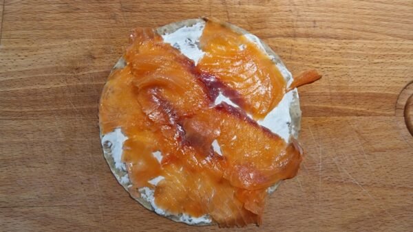 Lompe covered with sliced smoked salmon