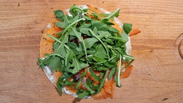 Smoked salmon lompe topped with arugula